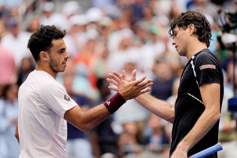Francisco Cerundolo shakes hands with Taylor Fritz Francisco Cerundolo shakes hands with Taylor Fritz