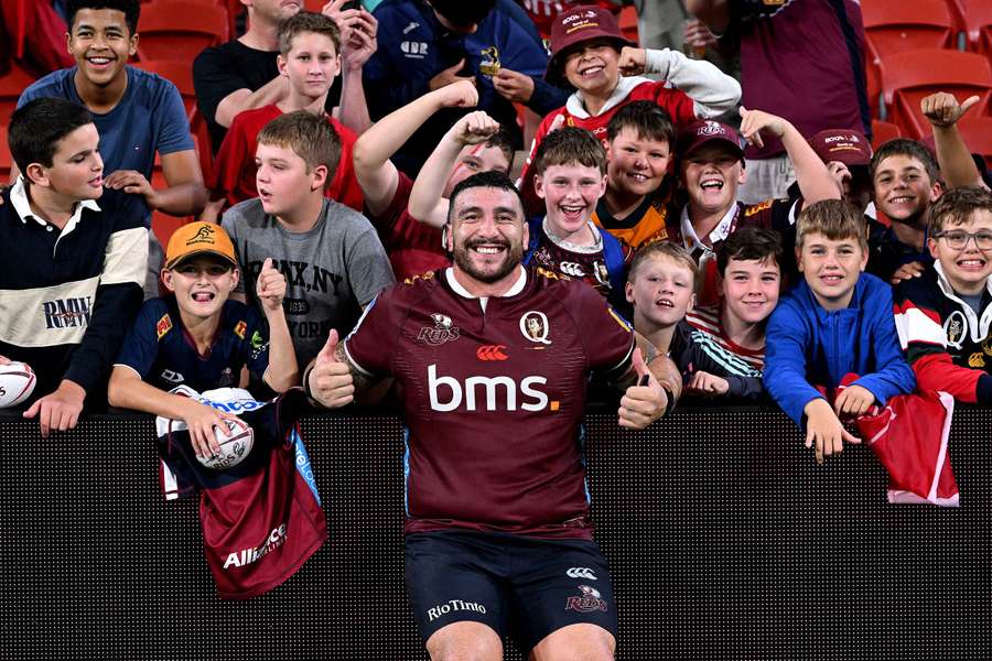 Queensland's Jeff Toomaga-Allen gets amongst the supporters after their big win over ACT Brumbies.