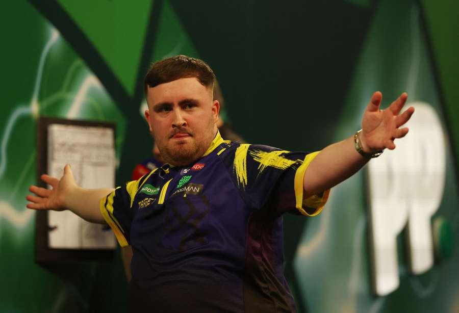 Luke Littler reacts during the final against Gian van Veen