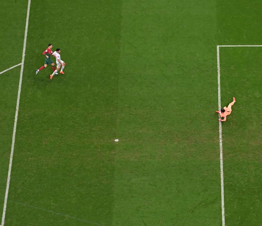 Cristiano Ronaldo shoots at goal in the 2022 World Cup game against Iran