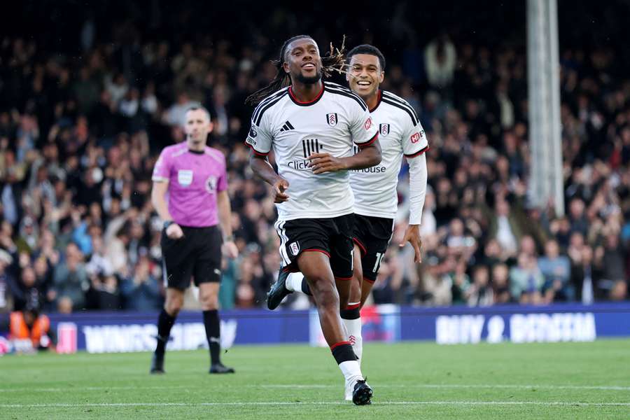 Alex Iwobi celebrates after scoring for Fulham at Craven Cottage