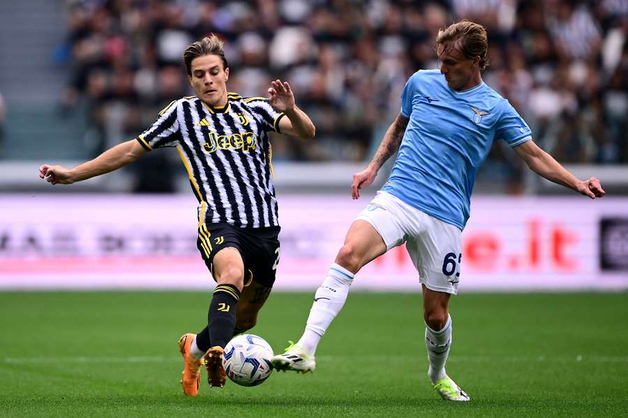 Juventus midfielder Nicolo Fagioli (L) in action against Lazio in September