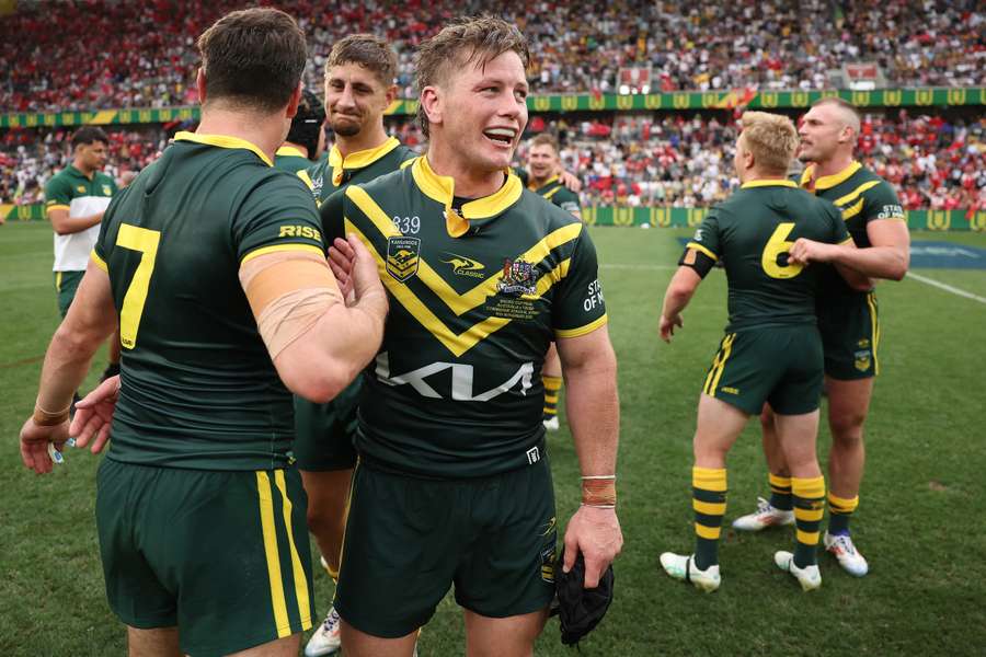 Harry Grant and Mitchell Moses celebrate Australia's 2024 Pacific Championships victory.