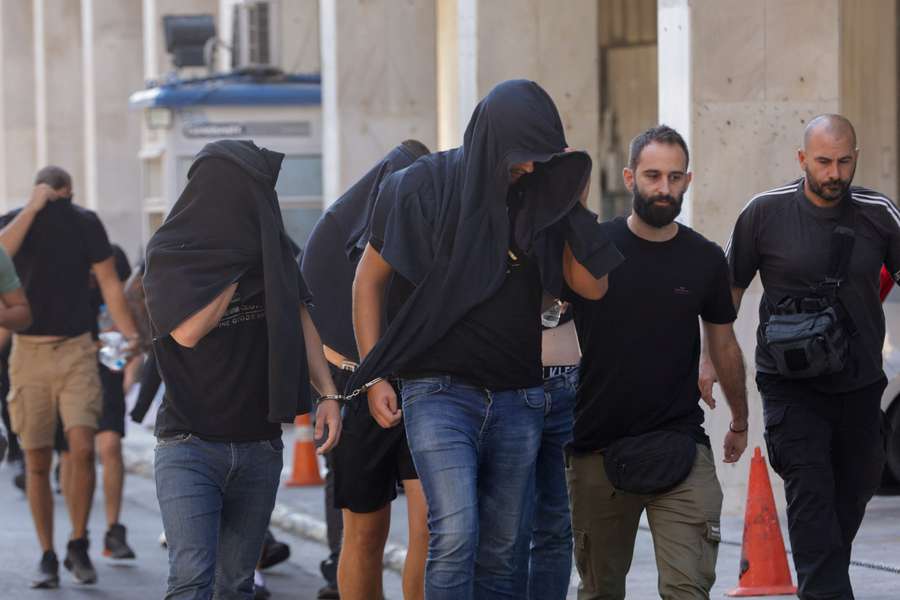 Dinamo fans being taken to a magistrate in Athens, Greece