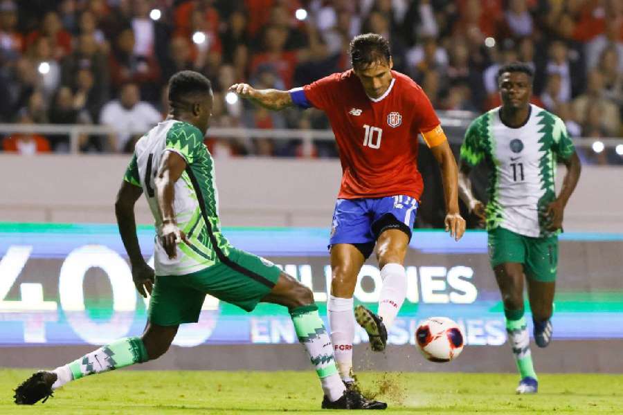 Costa Rica's Bryan Ruiz in action with Nigeria's Ejeh Isaiah