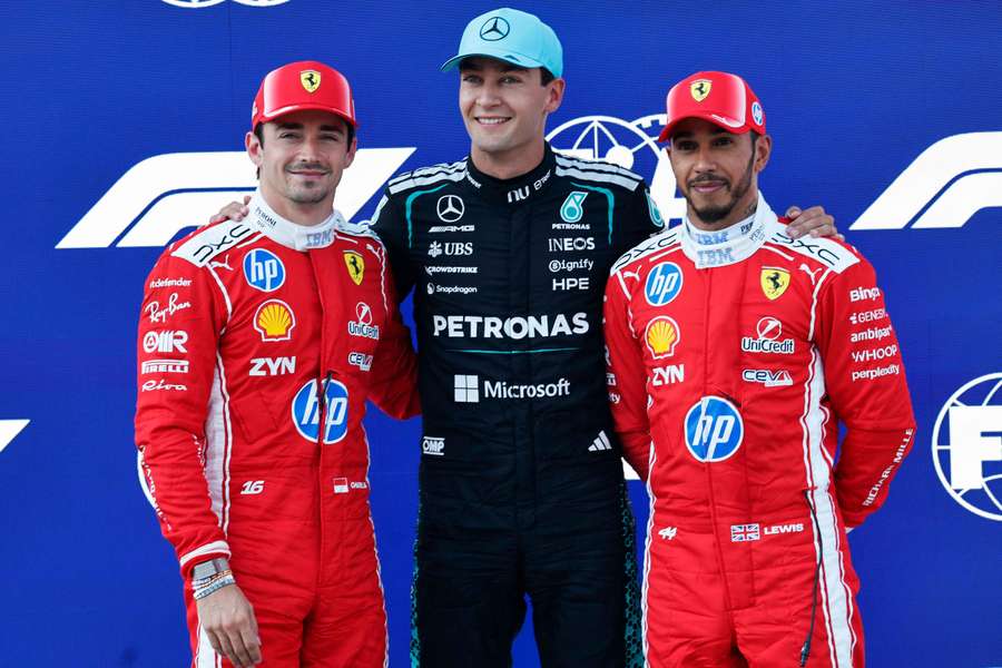 George Russell (C) alongside Charles Leclerc (L) and Lewis Hamilton
