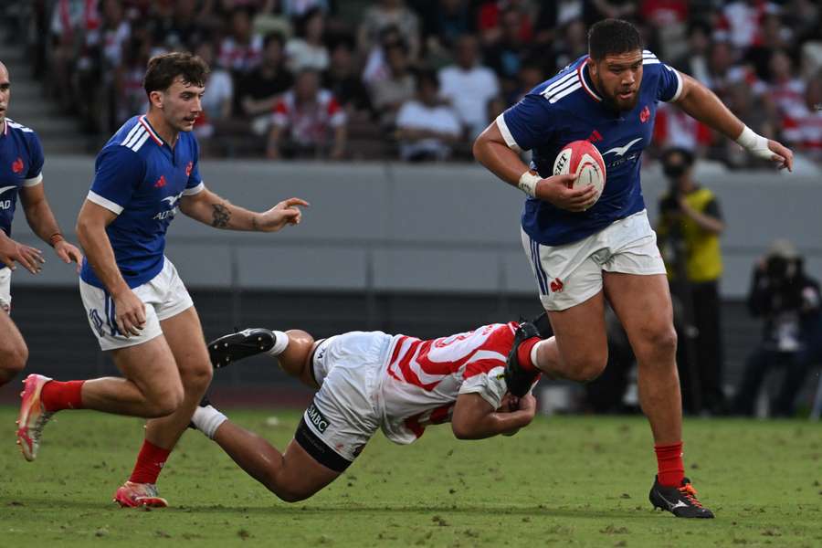 France’s Emmanuel Meafou (right) runs with the ball France’s Emmanuel Meafou (right) runs with the ball