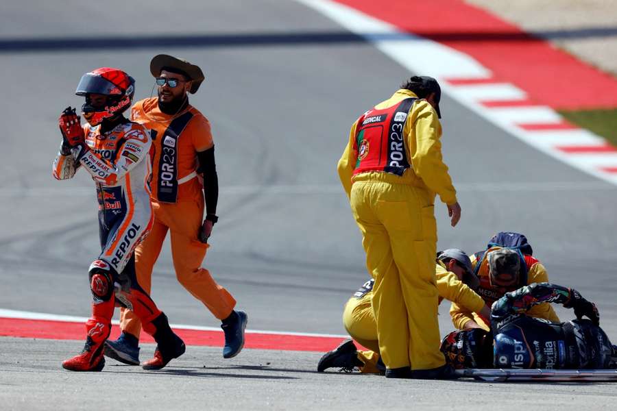 MotoGP Team's Miguel Oliveira receives medical attention after crashing