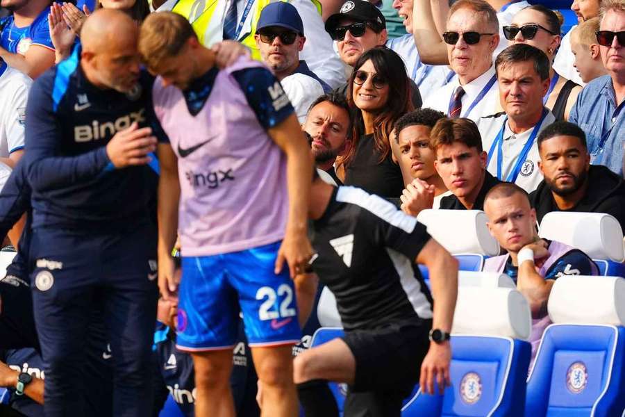 Reece James looks on from behind the dugout of Chelsea manager Enzo Maresca, Chelsea v Manchester City