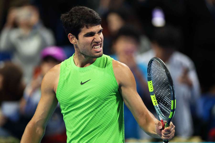 Carlos Alcaraz celebrates winning his match against Arthur Rinderknech in Doha