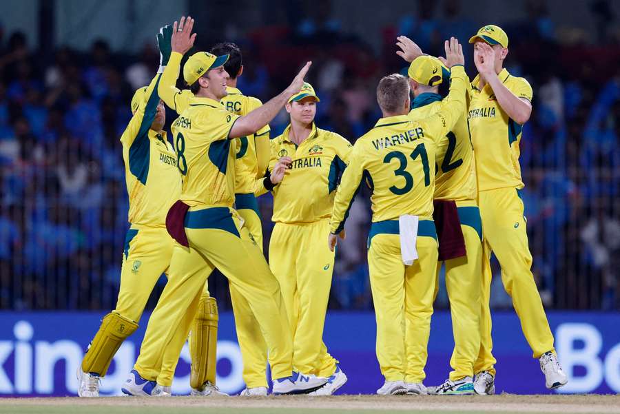 Australia's Cameron Green celebrates with teammates