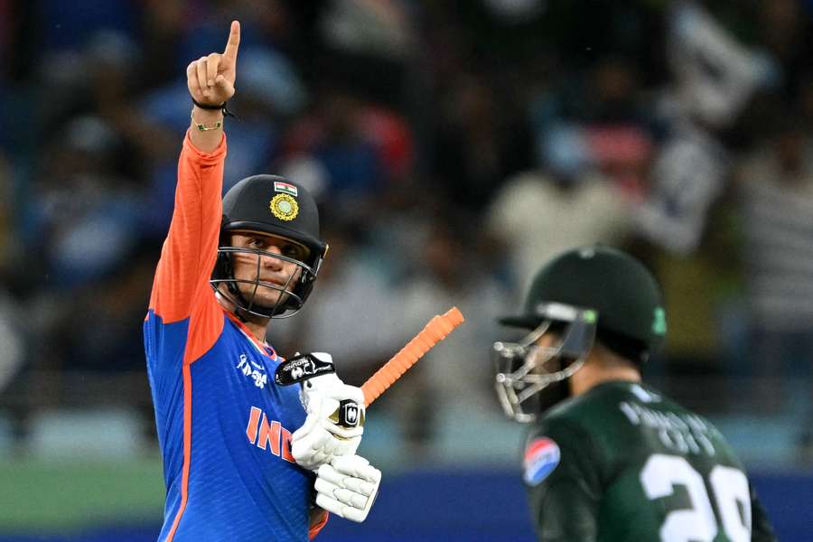 India's Abhishek Sharma celebrates after scoring a half-century against Pakistan