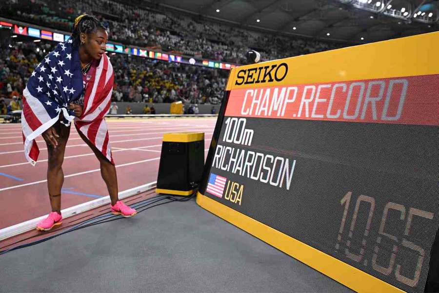 Sha'Carri Richardson looks stunned after setting a championship record in the 100m final