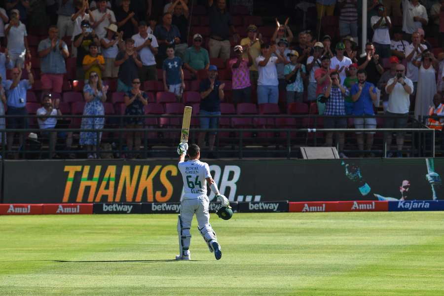 Elgar waves as he leaves the pitch