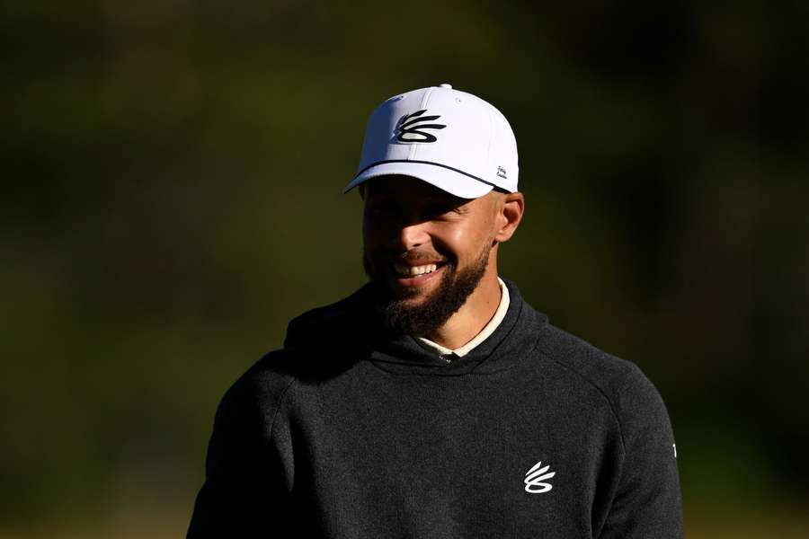 Curry, en un torneo de golf Curry, en un torneo de golf