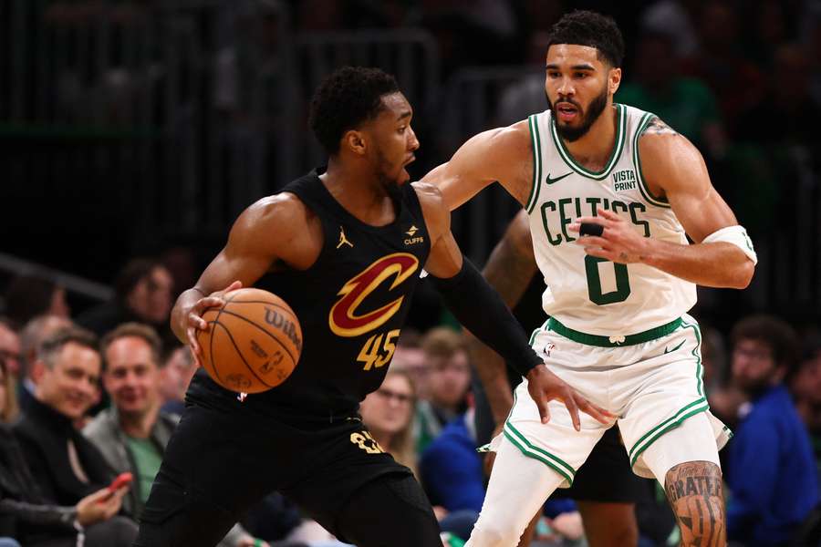 Cleveland's Donovan Mitchell drives against Jayson Tatum in the Cavaliers' victory over the Boston Celtics