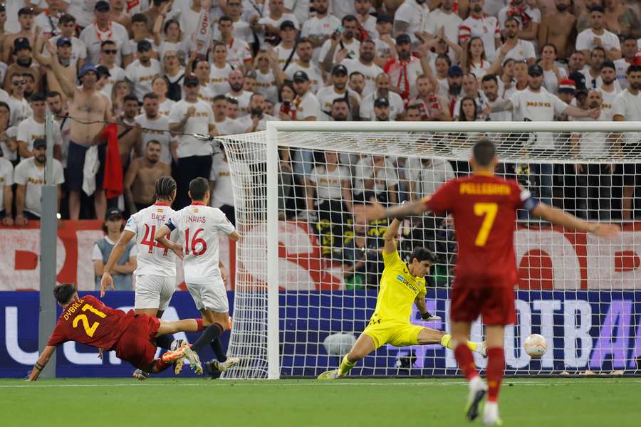 Paulo Dybala shoots to score the opening goal