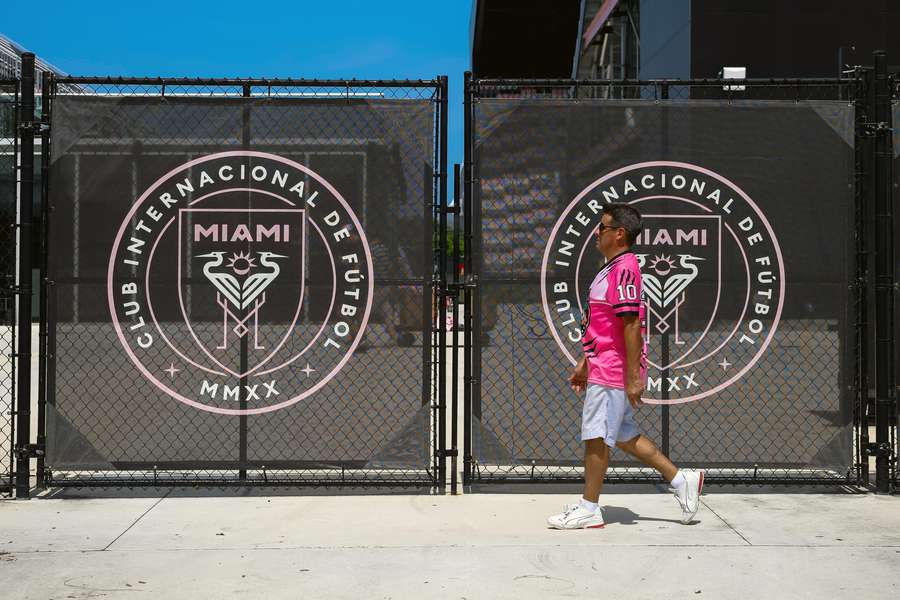 A fan of Argentine football player Lionel Messi walks outside DRV PNK Stadium in Fort Lauderdale, Florida