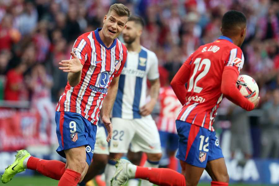 Alexander Sorloth (left) celebrates scoring Atletico's equaliser