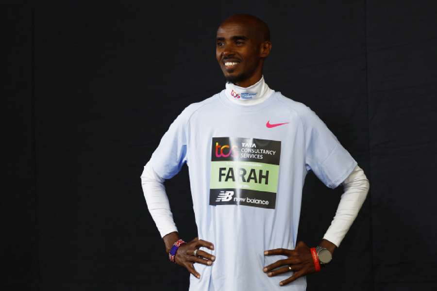 Mo Farah poses after the press conference ahead of the London marathon