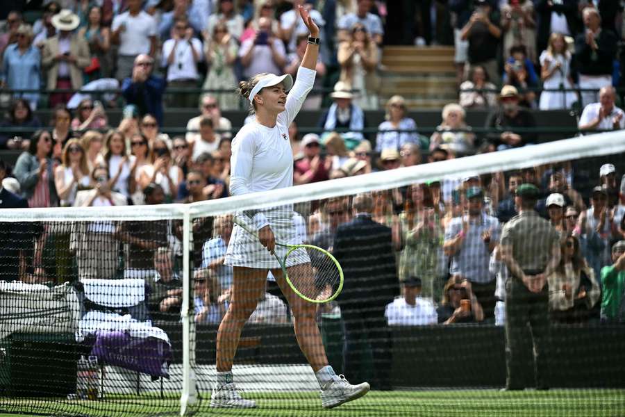 Barbora Krejcikova celebrates winning against Jelena Ostapenko