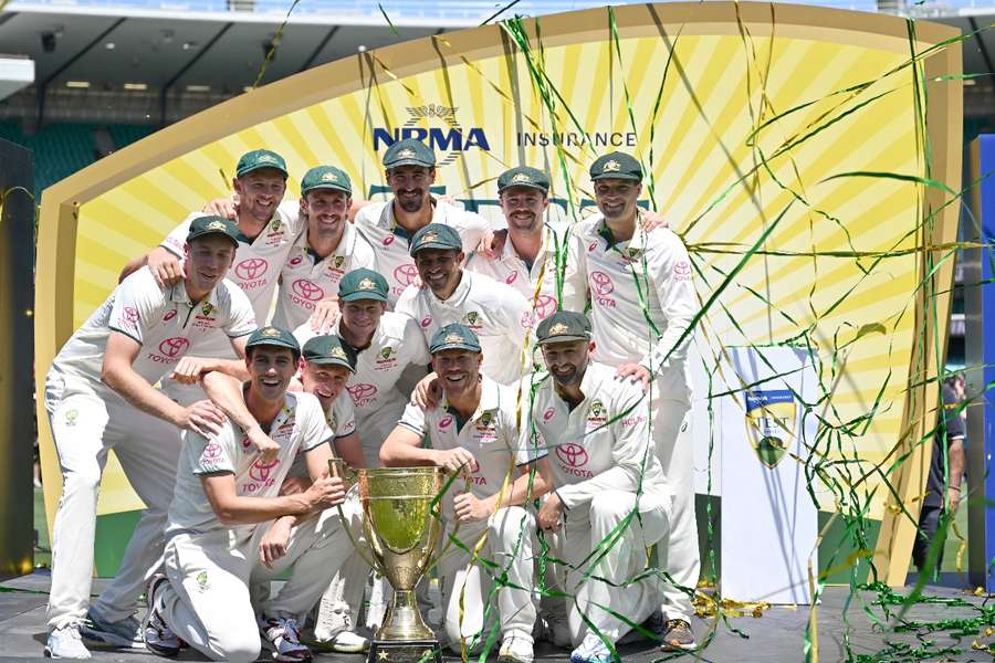 Australia players celebrate their win 