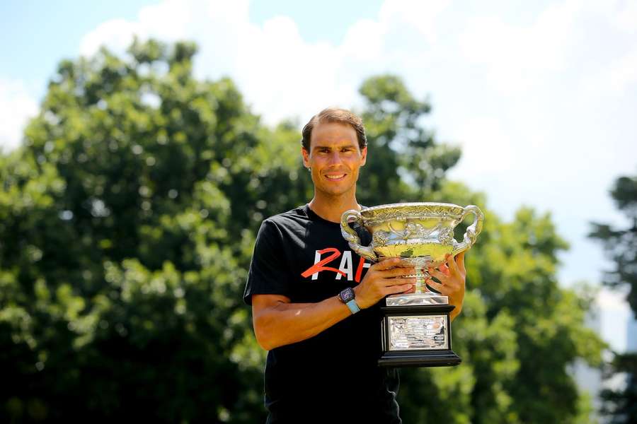 Rafael Nadal poses after winning the 2022 Australian Open