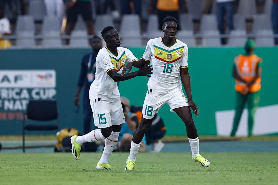 Senegal forward Ismaila Sarr celebrates with Krepin Diatta