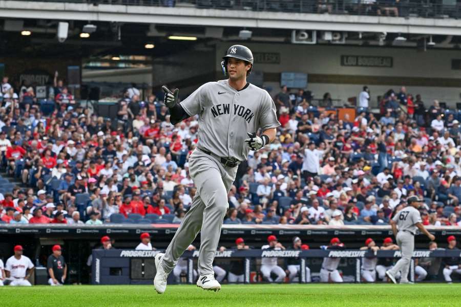 Yankees' Spencer Jones reacts after hitting his first career home run