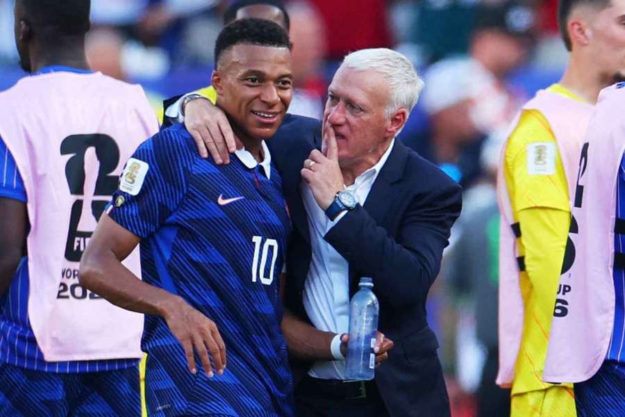 Kylian Mbappe and Didier Deschamps celebrate France's progression to the quarter-finals. Kylian Mbappe and Didier Deschamps celebrate France's progression to the quarter-finals.