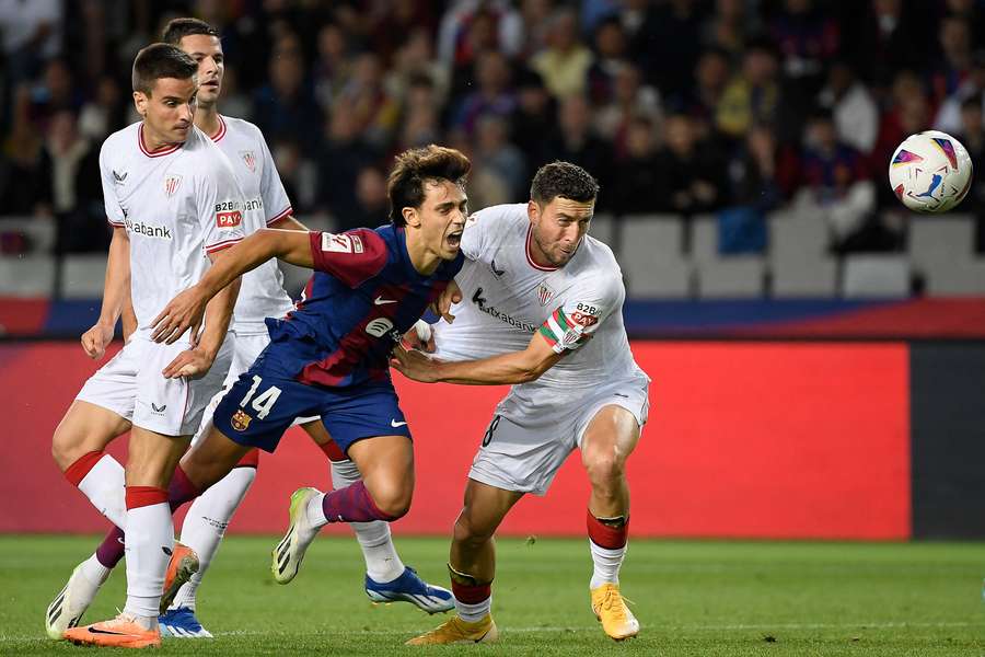 Barcelona's Portuguese forward #14 Joao Felix fights for the ball with Athletic Bilbao's Spanish defender #18 Oscar De Marcos