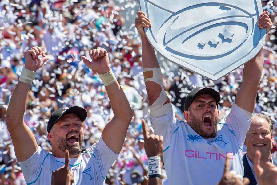 Giteau and David Dennis celebrate after winning the Major League Rugby Championship