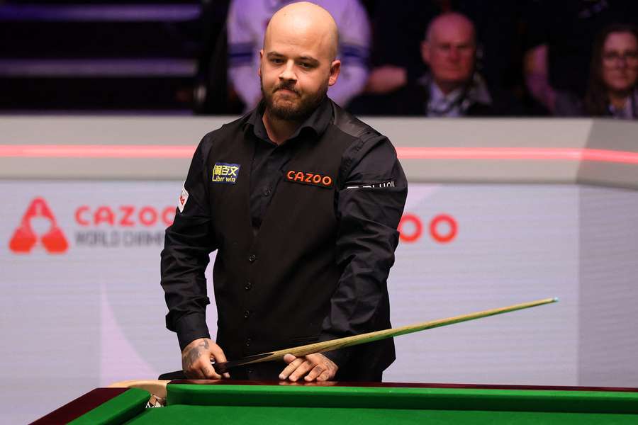 Luca Brecel is the latest defending champion to fall to the Crucible curse