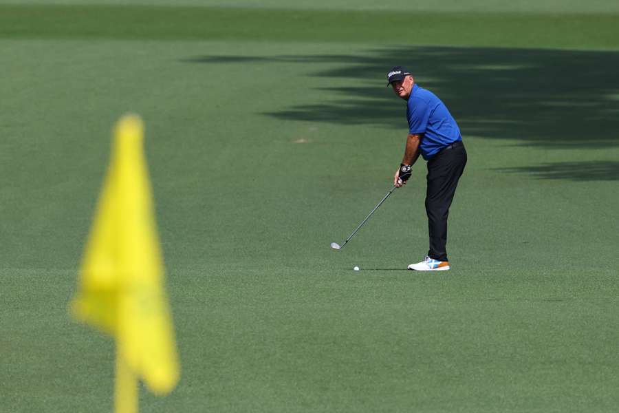 Sandy Lyle prepares to hit his approach on the second hole during the second round