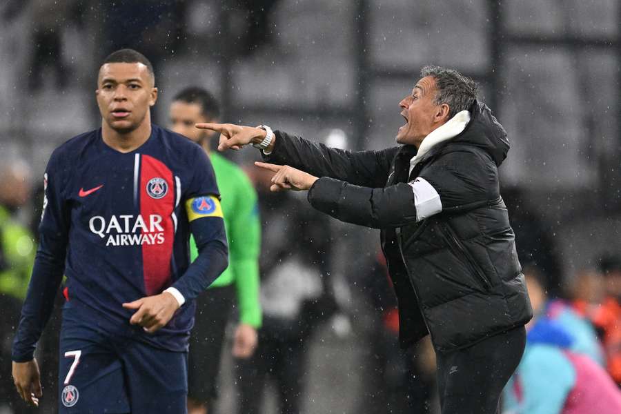 Enrique (R) is having to deal with the imminent departure of Mbappe