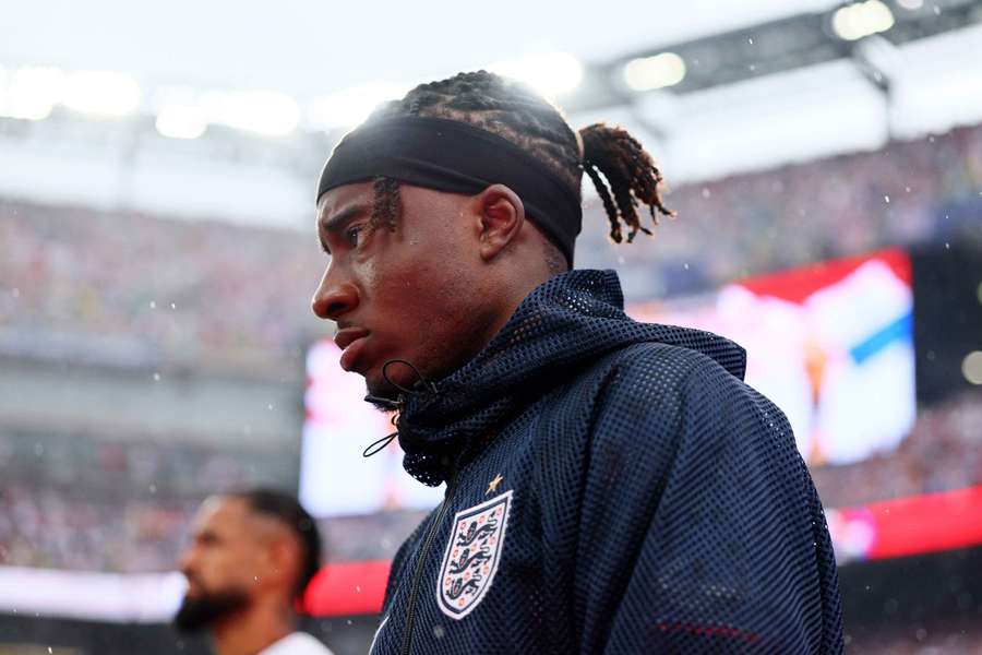 Noni Madueke walks onto the pitch before England's match against Panama