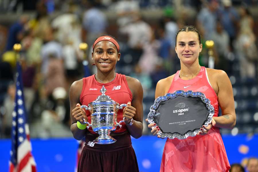 USA's Coco Gauff and Belarus's Aryna Sabalenka hold their trophies after Gauff won the US Open