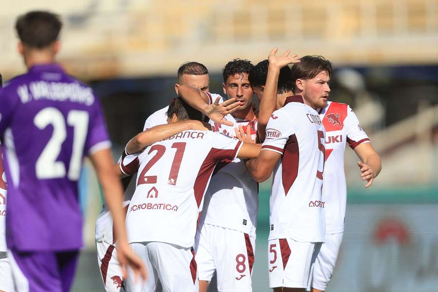Hráči Turína slaví gól proti Fiorentině. Hráči Turína slaví gól proti Fiorentině.