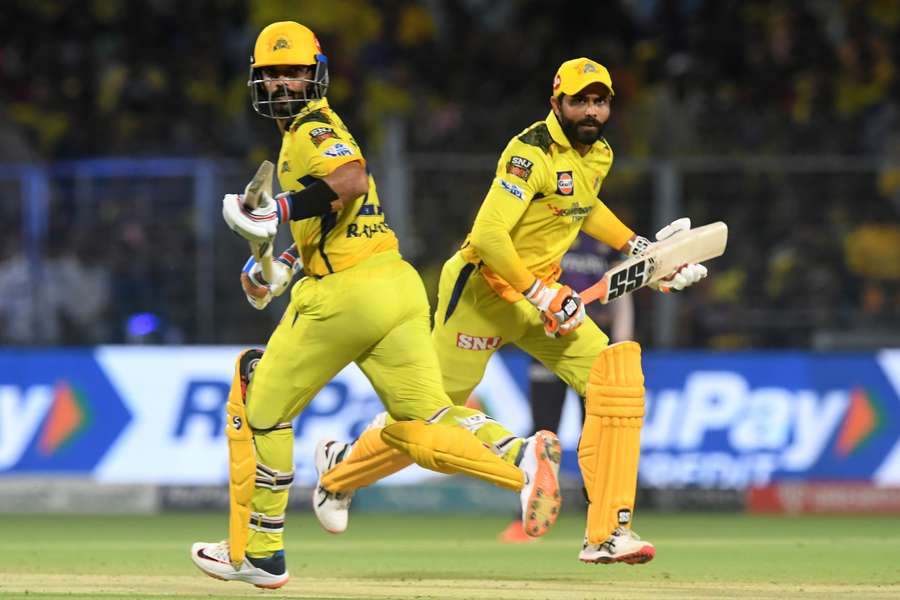 Chennai Super Kings' Ajinkya Rahane (L) and Ravindra Jadeja run between the wickets 