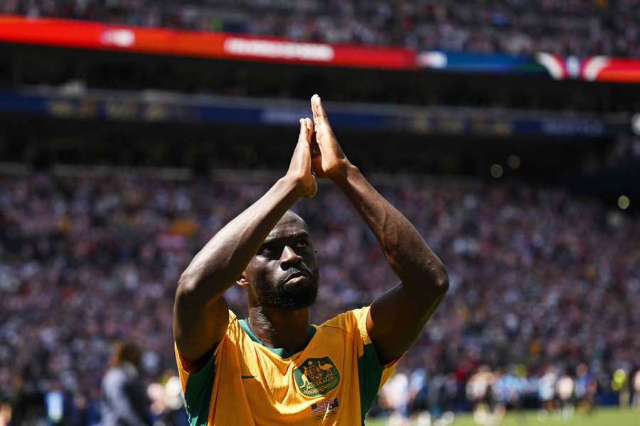 Jason Geria applauds the travelling Aussie fans in Seattle. Jason Geria applauds the travelling Aussie fans in Seattle.