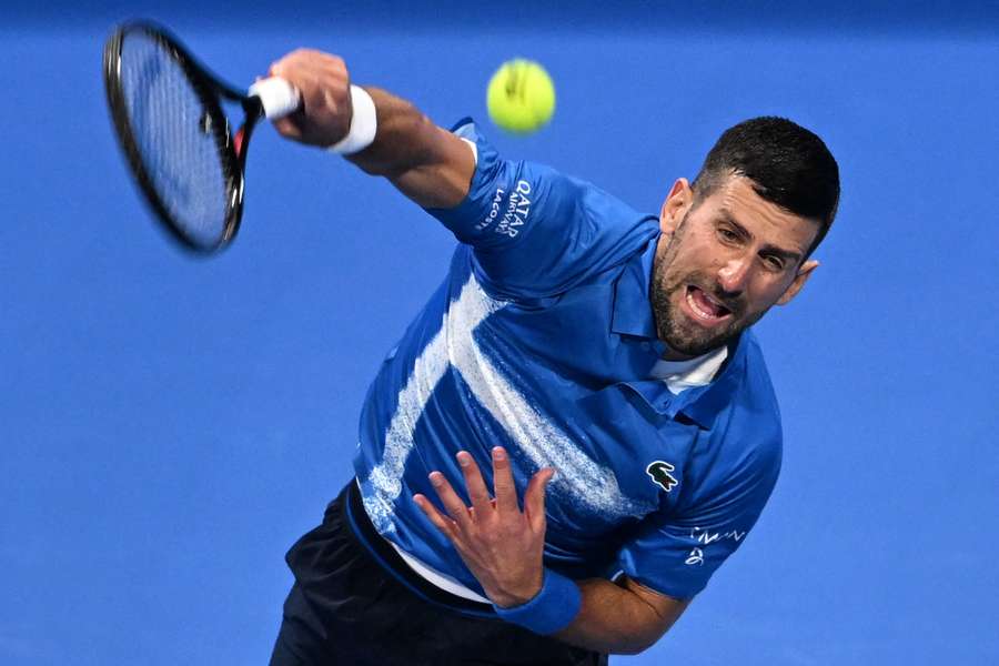 Serbia's Novak Djokovic serves against Italy's Matteo Berettini