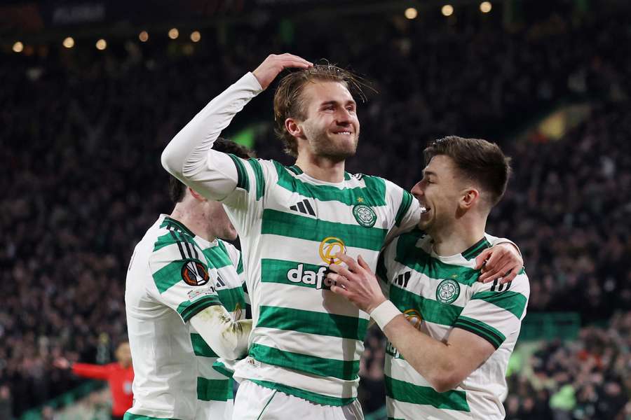 Celtic's Benjamin Nygren celebrates scoring their first goal with Kieran Tierney