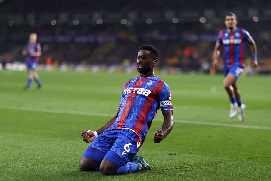 Marc Guehi celebrates scoring Crystal Palace's second goal against Wolves