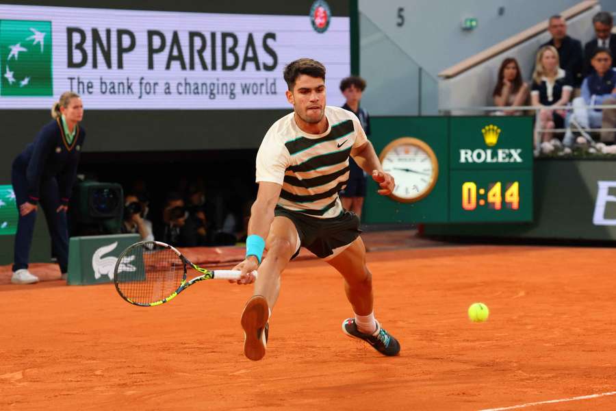 Carlos Alcaraz in action during his French Open quarter-final match against Tommy Paul