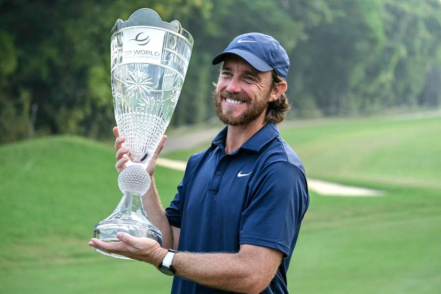 Tommy Fleetwood celebrates his title win in India