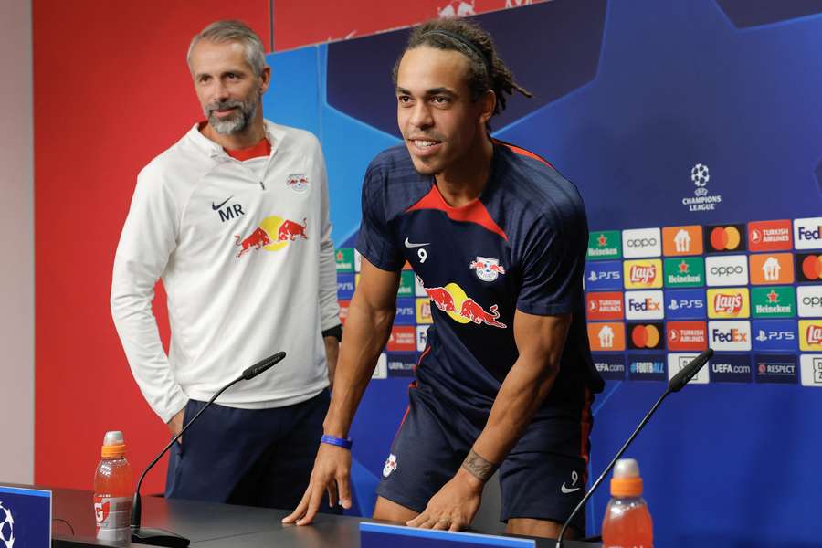 Leipzig's German head coach Marco Rose (L) and Leipzig's Danish forward Yussuf Poulsen attend a press conference 
