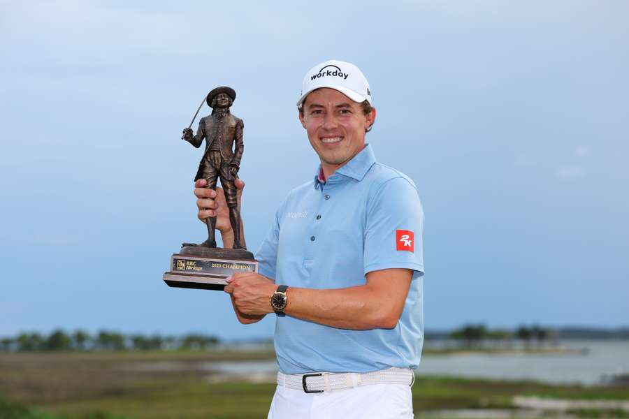 Matt Fitzpatrick of England celebrates with the trophy