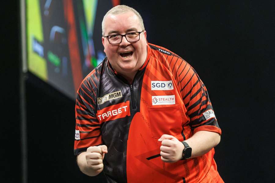 Stephen Bunting celebrates after winning night nine of the Premier League in Berlin