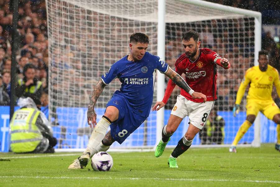 Chelsea's Enzo Fernandez holds off Man United's Bruno Fernandes