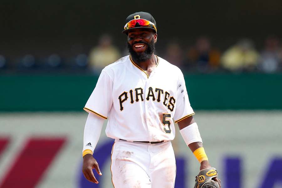 Former Pirates infielder Josh Harrison smiling in-between innings (2018)